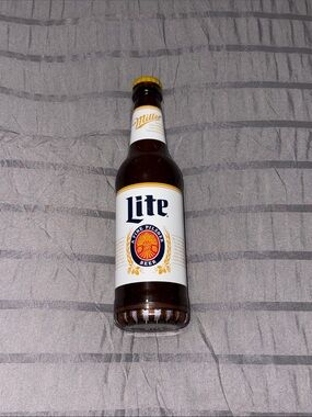 LITE Bottle-Shaped Portable Bluetooth Speaker in White and Brown